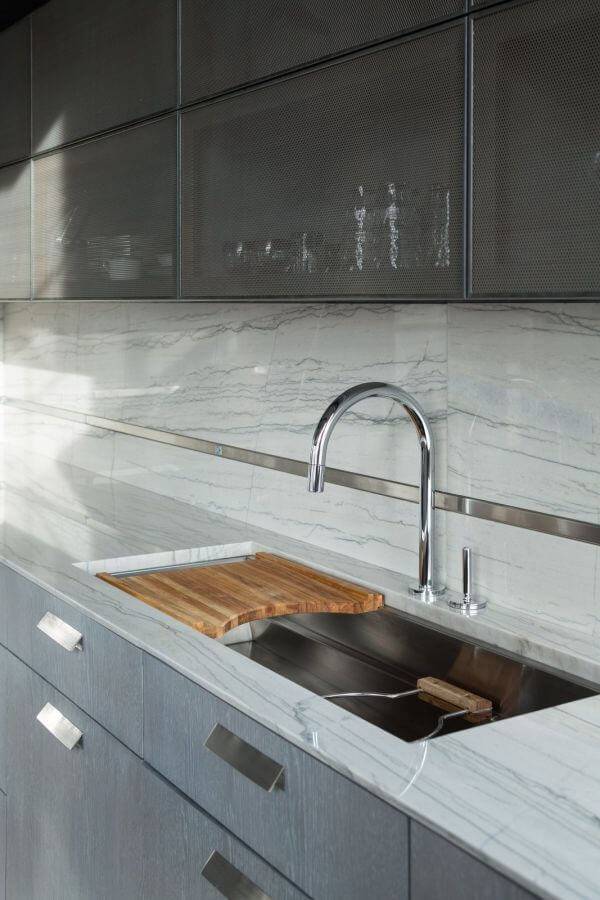 Read on for all the pros and cons to keep in mind for an educated decision about installing a kitchen sink.